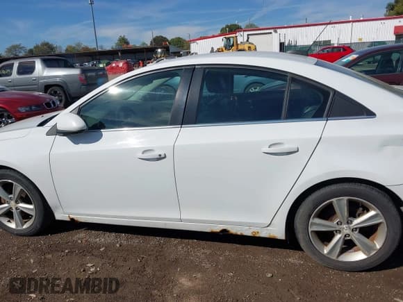 ✅ 2015 Chevrolet Cruze LT • VIN: 1G1PE5SB5F7258227 • Lot: 43460827. Listed on IAAI with 128,271 mi. Free auction sales archive from the USA and detailed vehicle history report at DreamBid. Image 14.