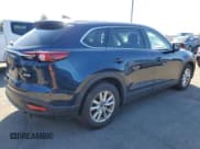 ✅ 2016 Mazda CX-9 Sport • VIN: JM3TCBBY6G0120552 • Lot: 48909625. Wystawiony na Copart z przebiegiem 126 802 mil. Bezpłatny archiwum sprzedaży aukcyjnych z USA i szczegółowy raport historii pojazdu na DreamBid. Zdjęcie 3.
