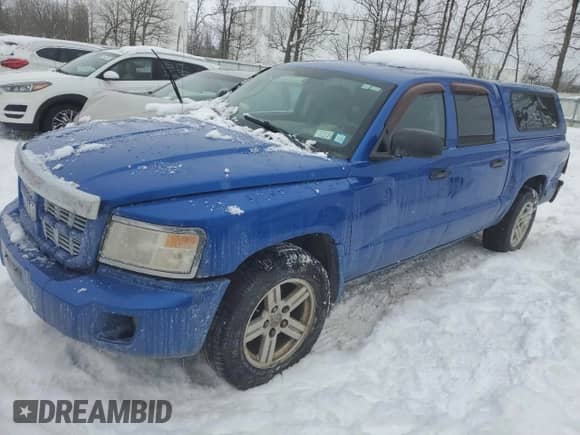 2008 Dodge Dakota z VIN 1D7HW68K28S503819, wystawiony jako Copart lot #44348935 z przebiegiem 141 005 mil mil oraz Szkoda całkowita • Salvage title. Historia ofert i sprzedaży dostępna na DreamBid. Obrazek 1.