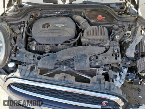 2015 MINI Hardtop S with VIN WMWXP7C56F2A58203, listed as a Copart auction lot 62602855 with 101,679 mi miles and Salvage title. Bid and sale history available at DreamBid. Image 11.