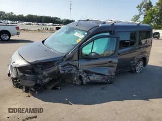 ✅ 2021 Ford Transit Connect XLT • VIN: NM0GS9F27M1504144 • Lot: 70214034. Listed on Copart with 45,827 mi. Free auction sales archive from the USA and detailed vehicle history report at DreamBid. Image 1.