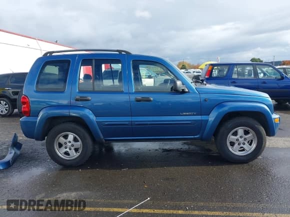 ✅ 2004 Jeep Liberty Limited • VIN: 1J4GL58KX4W232319 • Lot: 40870366. Listed on IAAI with 226,249 mi. Free auction sales archive from the USA and detailed vehicle history report at DreamBid. Image 14.