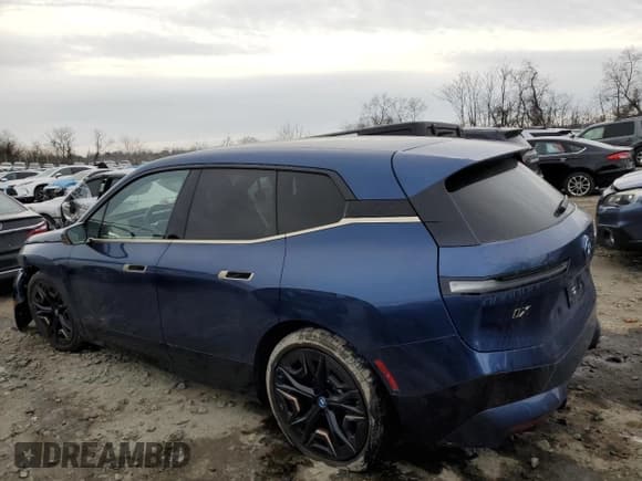 ✅ 2023 BMW iX M60 • VIN: WB533CF01PCM75951 • Lot: 42005405. Listed on Copart with 13,540 mi. Free auction sales archive from the USA and detailed vehicle history report at DreamBid. Image 2.