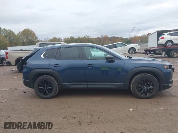 ✅ 2025 Mazda CX-50 S Premium • VIN: 7MMVABDM9SN345772 • Lot: 43562877. Wystawiony na IAAI z przebiegiem 19 553 mil. Bezpłatny archiwum sprzedaży aukcyjnych z USA i szczegółowy raport historii pojazdu na DreamBid. Zdjęcie 13.