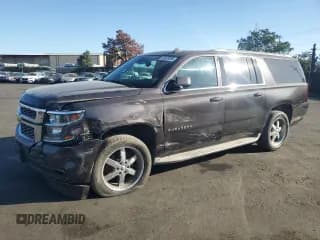 ✅ 2015 Chevrolet Suburban LT • VIN: 1GNSCJKC2FR238845 • Lot: 82429885. Listed on Copart with 65,404 mi. Free auction sales archive from the USA and detailed vehicle history report at DreamBid. Image 1.