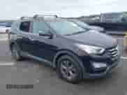 2016 Hyundai Santa Fe z VIN 5XYZUDLB4GG372753, wystawiony jako IAAI lot #43239818 z przebiegiem 134 901 mil mil oraz . Historia ofert i sprzedaży dostępna na DreamBid. Obrazek 1.