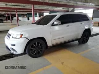 ✅ 2014 Jeep Grand Cherokee Summit • VIN: 1C4RJFJG3EC378404 • Lot: 69317825. Listed on Copart with 149,425 mi. Free auction sales archive from the USA and detailed vehicle history report at DreamBid. Image 1.