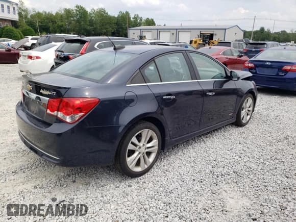 ✅ 2015 Chevrolet Cruze LTZ • VIN: 1G1PG5SB7F7282104 • Lot: 58312183. Listed on Copart with 66,850 mi. Free auction sales archive from the USA and detailed vehicle history report at DreamBid. Image 3.
