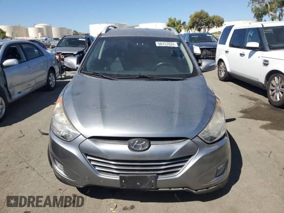 2013 Hyundai Tucson GLS z VIN KM8JU3AC6DU602057, wystawiony jako Copart lot #68757024 z przebiegiem 135 062 mil mil oraz Szkoda całkowita • Salvage title. Historia ofert i sprzedaży dostępna na DreamBid. Obrazek 5.