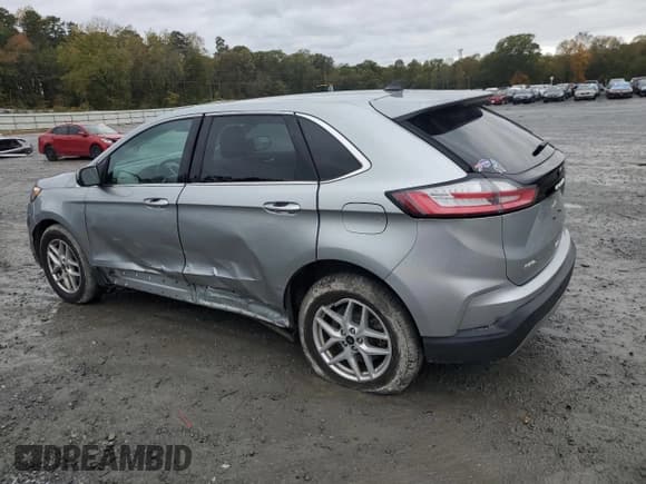 ✅ 2023 Ford Edge SEL • VIN: 2FMPK4J98PBA38352 • Lot: 82719145. Listed on Copart with 71,419 mi. Free auction sales archive from the USA and detailed vehicle history report at DreamBid. Image 2.