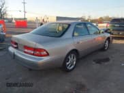 ✅ 2001 Lexus ES 300 • VIN: JT8BF28G110335644 • Lot: 43638293. Listed on IAAI with 124,923 mi. Free auction sales archive from the USA and detailed vehicle history report at DreamBid. Image 4.