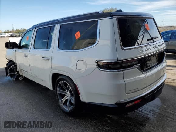 ✅ 2023 Jeep Grand Wagoneer • VIN: 1C4SJVEJ5PS511593 • Lot: 79725743. Listed on Copart with 7,482 mi. Free auction sales archive from the USA and detailed vehicle history report at DreamBid. Image 2.