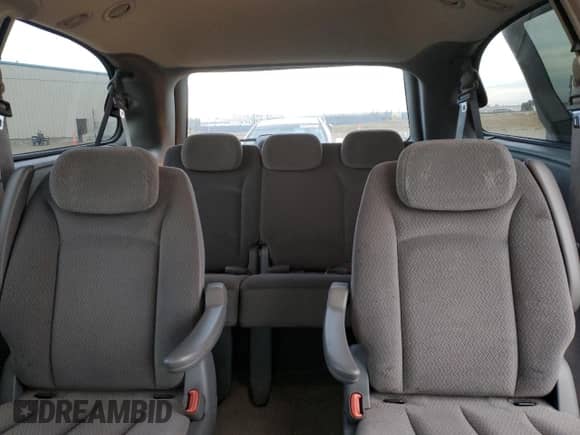 2006 Dodge Grand Caravan SE with VIN 1D4GP24R66B697589, listed as a Copart auction lot 90105685 with 303,817 mi miles and Salvage title. Bid and sale history available at DreamBid. Image 10.