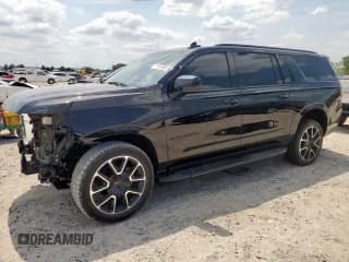 ✅ 2023 Chevrolet Suburban • VIN: 1GNSCEKT8PR130495 • Lot: 71785985. Listed on Copart with 115,347 mi. Free auction sales archive from the USA and detailed vehicle history report at DreamBid. Image 1.