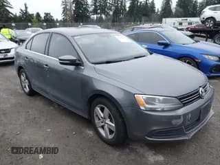 ✅ 2013 Volkswagen Jetta TDI w/Premium/Nav • VIN: 3VWLL7AJ5DM270569 • Lot: 43886609. Listed on IAAI with 104,035 mi. Free auction sales archive from the USA and detailed vehicle history report at DreamBid. Image 1.