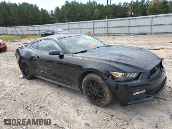 2015 Ford Mustang GT Premium with VIN 1FA6P8CF7F5310054, listed as a Copart auction lot 83888565 with 51,151 mi miles and Salvage title. Bid and sale history available at DreamBid. Image 4.