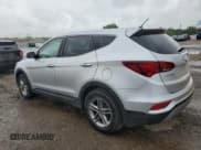 ✅ 2018 Hyundai Santa Fe 2.4L • VIN: 5XYZT3LB9JG569177 • Лот: 52165343. Опубликован ранее на Copart с пробегом Не указан. Бесплатный доступ к архиву аукционных продаж из США и подробный отчёт об истории автомобиля на DreamBid. Изображение 2.