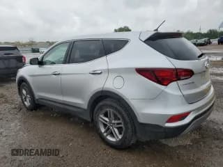 ✅ 2018 Hyundai Santa Fe 2.4L • VIN: 5XYZT3LB9JG569177 • Лот: 52165343. Опубликован ранее на Copart с пробегом Не указан. Бесплатный доступ к архиву аукционных продаж из США и подробный отчёт об истории автомобиля на DreamBid. Изображение 2.