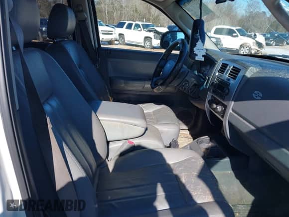 2005 Dodge Dakota Laramie with VIN 1D7HE58N35S138912, listed as a IAAI auction lot 41359470 with 263,136 mi miles and . Bid and sale history available at DreamBid. Image 5.