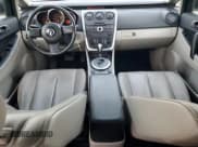 ✅ 2008 Mazda CX-7 Grand Touring • VIN: JM3ER29LX80202822 • Лот: 93779275. Опубликован ранее на Copart с пробегом 100 265 миль. Бесплатный доступ к архиву аукционных продаж из США и подробный отчёт об истории автомобиля на DreamBid. Изображение 8.