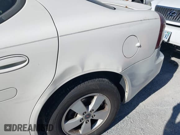 ✅ 2006 Pontiac Grand Prix • VIN: 2G2WP552761253220 • Лот: 43414529. Опубликован ранее на IAAI с пробегом 201 462 миль. Бесплатный доступ к архиву аукционных продаж из США и подробный отчёт об истории автомобиля на DreamBid. Изображение 6.