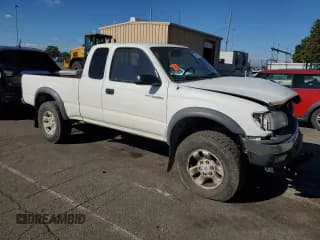 ✅ 2002 Toyota Tacoma • VIN: 5TEWM72N22Z043032 • Lot: 82479115. Listed on Copart with 243,393 mi. Free auction sales archive from the USA and detailed vehicle history report at DreamBid. Image 4.