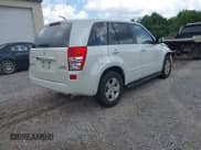 ✅ 2013 Suzuki Grand Vitara Premium • VIN: JS3TE0D68D4100201 • Lot: 42694457. Listed on IAAI with 126,585 mi. Free auction sales archive from the USA and detailed vehicle history report at DreamBid. Image 4.