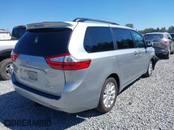 ✅ 2015 Toyota Sienna Limited • VIN: 5TDDK3DC5FS126524 • Lot: 42724732. Listed on IAAI with 98,946 mi. Free auction sales archive from the USA and detailed vehicle history report at DreamBid. Image 4.