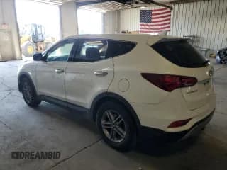 ✅ 2017 Hyundai Santa Fe 2.4L • VIN: 5NMZTDLB8HH027381 • Лот: 65454463. Опубликован ранее на Copart с пробегом Не указан. Бесплатный доступ к архиву аукционных продаж из США и подробный отчёт об истории автомобиля на DreamBid. Изображение 2.