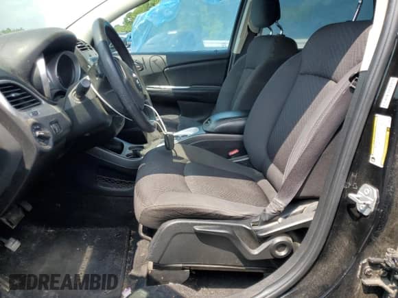 2017 Dodge Journey SE with VIN 3C4PDCAB8HT606195, listed as a Copart auction lot 60147455 with 125,120 mi miles and Salvage title. Bid and sale history available at DreamBid. Image 7.