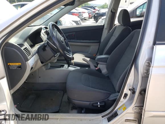 ✅ 2006 Kia Spectra • VIN: KNAFE161265211372 • Лот: 65632025. Опубликован ранее на Copart с пробегом 81 338 миль. Бесплатный доступ к архиву аукционных продаж из США и подробный отчёт об истории автомобиля на DreamBid. Изображение 7.