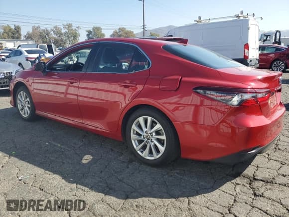 ✅ 2023 Toyota Camry LE • VIN: 4T1C11AK6PU129021 • Лот: 82696785. Опубликован ранее на Copart с пробегом 40 182 миль. Бесплатный доступ к архиву аукционных продаж из США и подробный отчёт об истории автомобиля на DreamBid. Изображение 2.