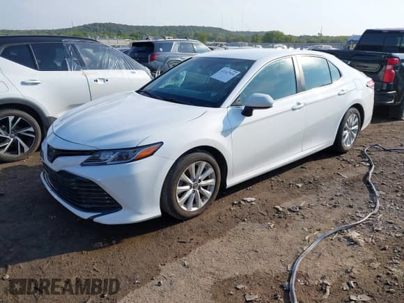 ✅ 2019 Toyota Camry LE • VIN: 4T1B11HK0KU803531 • Лот: 43247914. Опубликован ранее на IAAI с пробегом 97 359 миль. Бесплатный доступ к архиву аукционных продаж из США и подробный отчёт об истории автомобиля на DreamBid. Изображение 18.