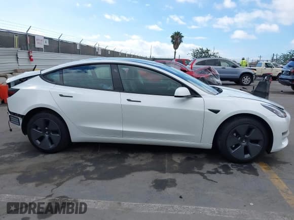 ✅ 2022 Tesla Model 3 • VIN: 5YJ3E1EA8NF245112 • Лот: 43372724. Опубликован ранее на IAAI с пробегом 27 724 миль. Бесплатный доступ к архиву аукционных продаж из США и подробный отчёт об истории автомобиля на DreamBid. Изображение 12.