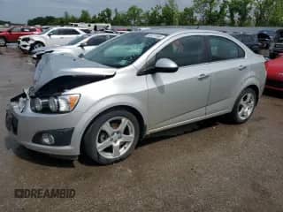 2013 Chevrolet Sonic LTZ с VIN 1G1JE5SG5D4217581, выставлен на аукционе Copart как лот 55977985 с пробегом 49 601 миль миль и Списание • Salvage title. История ставок и продаж доступна на DreamBid. Изображение 1.