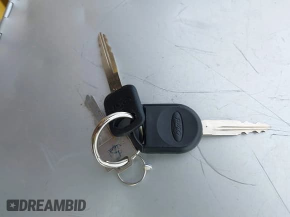 ✅ 2005 Ford Explorer Sport Trac XLS • VIN: 1FMZU67K75UA79569 • Лот: 41842068. Опубликован ранее на IAAI с пробегом 212 991 миль. Бесплатный доступ к архиву аукционных продаж из США и подробный отчёт об истории автомобиля на DreamBid. Изображение 11.