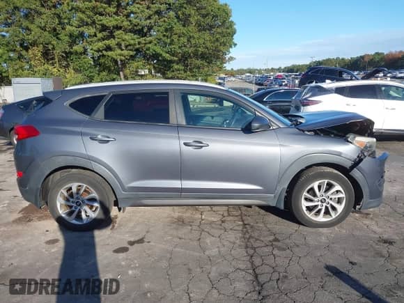 2016 Hyundai Tucson SE with VIN KM8J3CA48GU053428, listed as a IAAI auction lot 43407227 with 121,790 mi miles and . Bid and sale history available at DreamBid. Image 13.