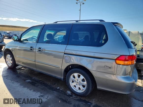 ✅ 2002 Honda Odyssey EX-L • VIN: 2HKRL18912H540373 • Лот: 85757615. Опубликован ранее на Copart с пробегом 227 720 миль. Бесплатный доступ к архиву аукционных продаж из США и подробный отчёт об истории автомобиля на DreamBid. Изображение 2.