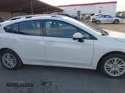 ✅ 2017 Subaru Impreza Premium • VIN: 4S3GTAD69H3719297 • Lot: 43799712. Listed on IAAI with 96,375 mi. Free auction sales archive from the USA and detailed vehicle history report at DreamBid. Image 13.