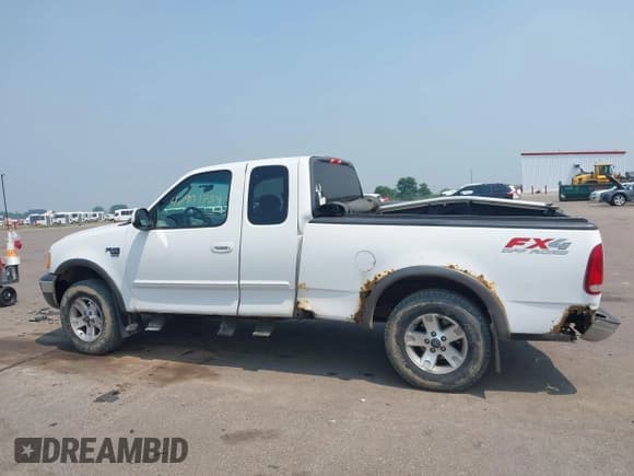 ✅ 2002 Ford F-150 XL • VIN: 2FTRX18L22CA68206 • Lot: 42901754. Wystawiony na IAAI z przebiegiem 138 865 mil. Bezpłatny archiwum sprzedaży aukcyjnych z USA i szczegółowy raport historii pojazdu na DreamBid. Zdjęcie 14.