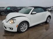 ✅ 2014 Volkswagen Beetle 2.0L TDI • VIN: 3VW5L7AT9EM823171 • Lot: 69486244. Listed on Copart with 65,557 mi. Free auction sales archive from the USA and detailed vehicle history report at DreamBid. Image 1.