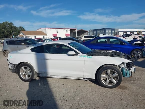 ✅ 2016 Ford Mustang V6 • VIN: 1FA6P8AM7G5301910 • Lot: 43393740. Listed on IAAI with 59,878 mi. Free auction sales archive from the USA and detailed vehicle history report at DreamBid. Image 13.