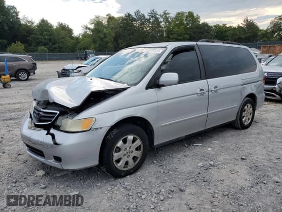 ✅ 2003 Honda Odyssey EX-L • VIN: 5FNRL18903B028216 • Lot: 66751834. Listed on Copart with Not provided. Free auction sales archive from the USA and detailed vehicle history report at DreamBid. Image 1.