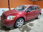 ✅ 2007 Dodge Caliber SXT • VIN: 1B3HB48B57D170501 • Лот: 87200974. Опубликован ранее на Copart с пробегом 166 019 миль. Бесплатный доступ к архиву аукционных продаж из США и подробный отчёт об истории автомобиля на DreamBid. Изображение 1.