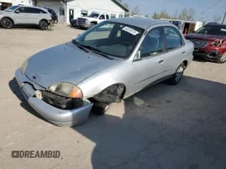 ✅ 1999 Chevrolet Metro Lsi • VIN: 2C1MR5226X6710571 • Лот: 54252415. Опубликован ранее на Copart с пробегом 67 773 миль. Бесплатный доступ к архиву аукционных продаж из США и подробный отчёт об истории автомобиля на DreamBid. Изображение 1.