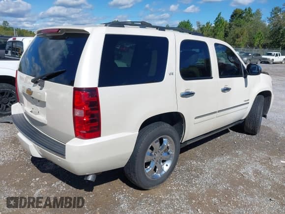 ✅ 2013 Chevrolet Tahoe LTZ • VIN: 1GNSCCE09DR141152 • Lot: 43560948. Listed on IAAI with 191,284 mi. Free auction sales archive from the USA and detailed vehicle history report at DreamBid. Image 4.