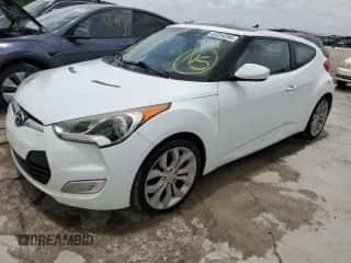 2012 Hyundai Veloster w/Red Int z VIN KMHTC6AD4CU055889, wystawiony jako Copart lot #62264394 z przebiegiem 138 504 mil mil oraz Szkoda całkowita • Salvage title. Historia ofert i sprzedaży dostępna na DreamBid. Obrazek 1.
