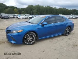 2020 Toyota Camry Hybrid SE with VIN 4T1G31AK9LU018842, listed as a Copart auction lot 82271955 with 105,510 mi miles and Salvage title. Bid and sale history available at DreamBid. Image 1.