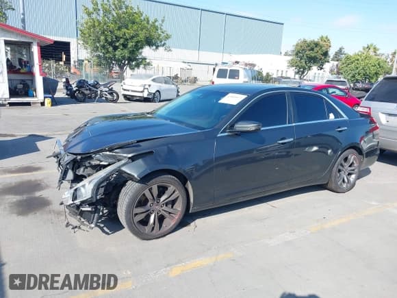 ✅ 2014 Cadillac CTS Vsport RWD • VIN: 1G6AU5S82E0171383 • Lot: 43049573. Wystawiony na IAAI z przebiegiem 149 547 mil. Bezpłatny archiwum sprzedaży aukcyjnych z USA i szczegółowy raport historii pojazdu na DreamBid. Zdjęcie 2.