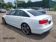 ✅ 2014 Audi S6 • VIN: WAUF2BFC9EN098227 • Lot: 42622167. Wystawiony na IAAI z przebiegiem 68 880 mil. Bezpłatny archiwum sprzedaży aukcyjnych z USA i szczegółowy raport historii pojazdu na DreamBid. Zdjęcie 3.